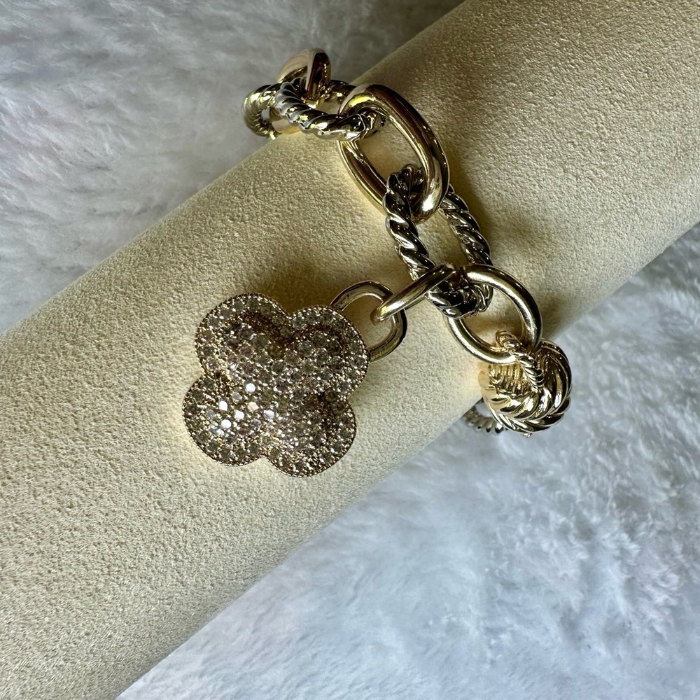 Elegant Gold and Silver Bracelet with Floral Charm